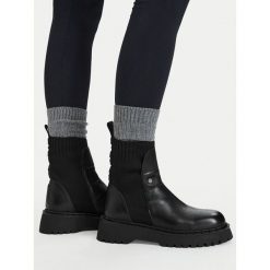 Sztyblety G-Star. Czarne botki damskie G-Star, retro, bez obcasa, na płaskiej podeszwie, bez zapięcia. Za 449.99 zł.