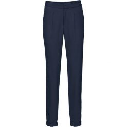Spodnie Loose Fit bonprix ciemnoniebieski. Niebieskie spodnie dresowe damskie bonprix, w paski. Za 49.99 zł.