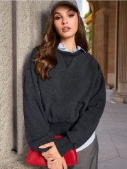Bluza - czarny. Czarne bluzy damskie Sinsay, l, bez wzorów, bez kaptura. Za 39.99 zł.