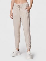 Marc Aurel Spodnie materiałowe 1615 2300 93133 Beżowy Loose Fit. Brązowe spodnie materiałowe damskie Marc Aurel, bez wzorów, z bawełny. Za 829.99 zł.