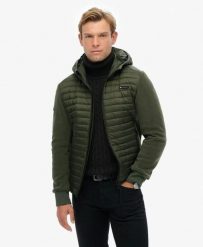 Superdry Kurtka Hooded Storm Fleece Hybrid – pikowany przód – IVY GREEN. Zielone kurtki damskie Superdry, xl, bez wzorów, z polaru, z kapturem. Za 473.65 zł.
