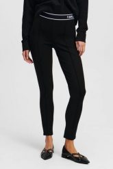 KARL LAGERFELD Czarne damskie legginsy. Czarne legginsy damskie KARL LAGERFELD, xs, bez wzorów, z materiału. W wyprzedaży za 389.99 zł.