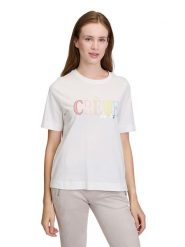 CARTOON Koszulka w kolorze białym rozmiar: 34. Białe bluzki damskie Cartoon, bez wzorów, z bawełny, bez kołnierzyka, bez ramiączek. Za 69.99 zł.