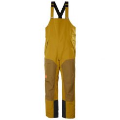 Damski kombinezon narciarski Helly Hansen Emiko Shell Bib. Brązowe kombinezony damskie Helly Hansen, bez wzorów, sportowe, bez kołnierzyka, bez ramiączek. Za 1,105.60 zł.