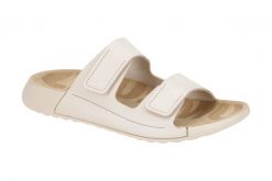 Klapki damskie Ecco Cozmo Flat Limestone. Brązowe klapki damskie ECCO, bez wzorów, z materiału, bez obcasa, bez zapięcia. Za 423.90 zł.