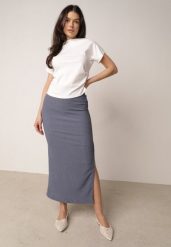 Niebieska Prosta Spódnica z Rozcięciem z Boku ze Strukturalnej Tkaniny Orinelin. Niebieskie spódnice damskie Born2be, do pracy, m, bez wzorów, z tkaniny, biznesowe, maxi. Za 39.99 zł.