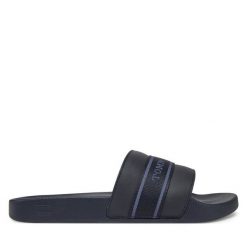 Klapki Tommy Hilfiger. Niebieskie klapki damskie Tommy Hilfiger, bez wzorów, bez obcasa, bez zapięcia. Za 99.99 zł.