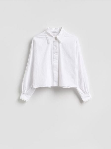 Koszula z bawełną - biały. Białe koszule damskie Reserved, l, bez wzorów, z bawełny, bez kołnierzyka, bez ramiączek. Za 149.99 zł.