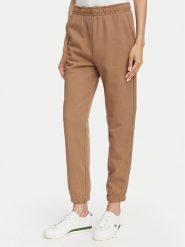 Lacoste Spodnie dresowe XF5268 Beżowy Regular Fit. Brązowe spodnie dresowe damskie Lacoste, bez wzorów, z bawełny. Za 549.99 zł.