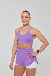 Spodenki do biegania 2 w 1 Elite - fioletowe. Fioletowe spodenki sportowe damskie OOSC, m, bez wzorów, z materiału, z podwyższonym stanem, do biegania. Za 171.99 zł.