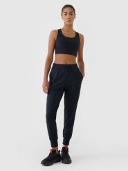 4F Spodnie treningowe szybkoschnące damskie - czarne S. Czarne spodnie dresowe damskie 4F, s, bez wzorów, z dzianiny, na fitness i siłownię. Za 179.99 zł.