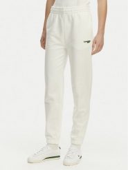 Lacoste Spodnie dresowe XF7604 Biały Regular Fit. Białe spodnie dresowe damskie Lacoste, bez wzorów, z bawełny. Za 569.99 zł.