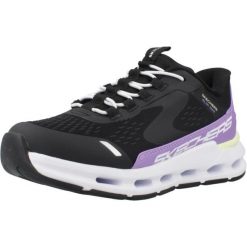 Buty SKECHERS SLIP-INS GLIDESTEP VISTA LANE Czarny. Czarne obuwie trekkingowe damskie Skechers, z syntetyku, bez zapięcia. Za 276.09 zł.