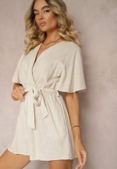 Beżowy Kopertowy Kombinezon z Bawełny Wiązany w Talii Materiałowym Paskiem Vikly. Brązowe sukienki damskie Renee, bez wzorów, z bawełny, eleganckie, bez ramiączek. W wyprzedaży za 75.99 zł.