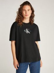 CALVIN KLEIN JEANS Koszulka w kolorze czarnym rozmiar: XS. Czarne bluzki damskie Calvin Klein Jeans, xs, bez wzorów, z bawełny, bez kołnierzyka, bez ramiączek. Za 96.60 zł.