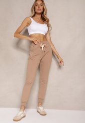 Ciemnobeżowe Spodnie Dresowe z Bawełny o Kroju Jogger High Waist Cherisa. Brązowe spodnie dresowe damskie Renee, bez wzorów, z bawełny. Za 49.99 zł.