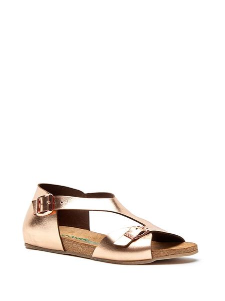 Comfortfusse Skórzane sandały w kolorze różowozłotym rozmiar: 40. Różowe sandały damskie Comfortfüße, bez wzorów, ze skóry, z otwartym noskiem, bez obcasa, bez zapięcia. Za 202.50 zł.