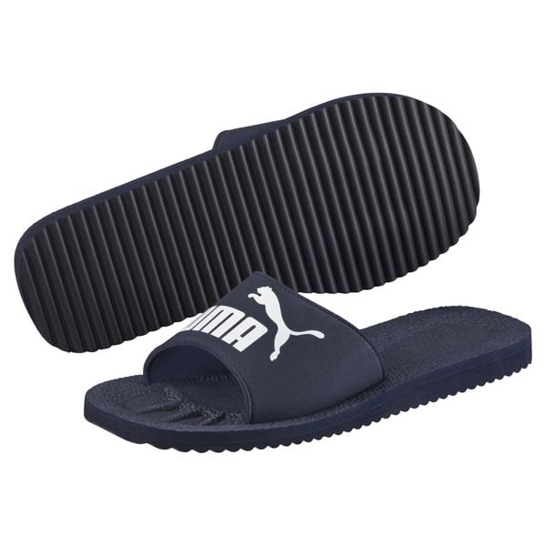 Klapki Puma Purecat unisex. Białe klapki damskie Puma, bez wzorów, z materiału, bez obcasa, bez zapięcia. Za 101.00 zł.