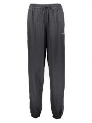 Adidas Spodnie dresowe w kolorze czarnym rozmiar: M. Czarne spodnie dresowe damskie Adidas, m, bez wzorów, z dresówki. Za 166.88 zł.