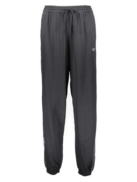 Adidas Spodnie dresowe w kolorze czarnym rozmiar: M. Czarne spodnie dresowe damskie Adidas, m, bez wzorów, z dresówki. Za 136.45 zł.