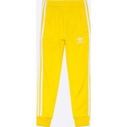 Adidas Originals - Spodnie dziecięce 128-164 cm. Spodnie materiałowe chłopięce marki 4F. W wyprzedaży za 129.90 zł.