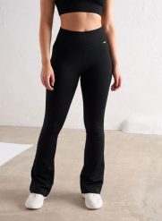 Damskie legginsy bezszwowe prążkowane rozszerzane wysoki stan squat proof czarne. Czarne legginsy damskie Aim'n, s, bez wzorów, z dzianiny, z podwyższonym stanem, na fitness i siłownię. Za 296.00 zł.