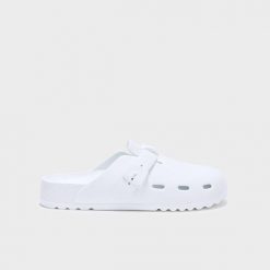 Klapki basenowe unisex do pływania Bahia Clog białe. Białe klapki damskie Scholl, bez wzorów, z materiału, bez obcasa, bez zapięcia. Za 134.99 zł.