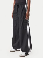 Adidas Spodnie dresowe Firebird Adilenium Twill 3S Cargo Trousers KQ6428 Czarny Relaxed Fit. Czarne spodnie dresowe damskie Adidas, m, bez wzorów, z dresówki. Za 369.99 zł.