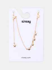 Naszyjnik z gwiazdkami - złoty. Żółte naszyjniki damskie Sinsay, złote. Za 9.99 zł.