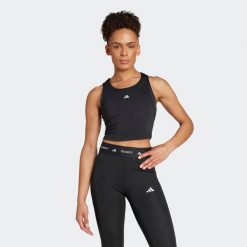 Koszulka fitness damska ADIDAS bez rękawów. Koszulki sportowe damskie Adidas, l, bez wzorów, ze skóry, bez ramiączek, na fitness i siłownię. Za 139.99 zł.