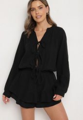 Czarny Wiązany Bawełniany Kombinezon Boho z Falbankami i Wiązaniem Lalelia. Czarne sukienki damskie Born2be, bez wzorów, z bawełny, boho, bez ramiączek. W wyprzedaży za 144.49 zł.