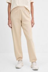 GUESS Beżowe damskie spodnie dresowe Primula, Rozmiar XS. Brązowe spodnie dresowe damskie Guess, s, z aplikacjami, z dresówki. W wyprzedaży za 251.99 zł.