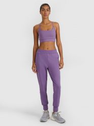 4F Spodnie treningowe szybkoschnące damskie - fioletowe S. Czerwone spodnie sportowe damskie 4F, s, bez wzorów, z dzianiny, na fitness i siłownię. Za 179.99 zł.