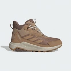Buty trekkingowe Terrex Anylander CLIMAWARM+. Brązowe obuwie trekkingowe damskie Adidas, z materiału, bez zapięcia. Za 529.00 zł.
