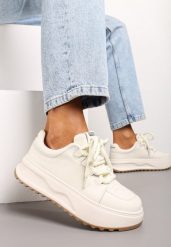 Białe Sneakersy ze Skóry Naturalnej z Platformą i Szerokimi Sznurówkami Talthea. Białe obuwie sportowe damskie Renee, z jeansu, bez zapięcia. Za 179.99 zł.