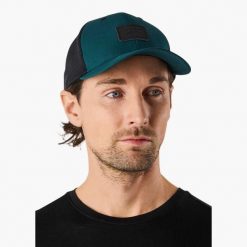 Czapka z daszkiem Unisex Swedemount Nordkap Trucker Cap II. Niebieskie czapki z daszkiem damskie SWEDEMOUNT, bez wzorów, z materiału. Za 79.99 zł.