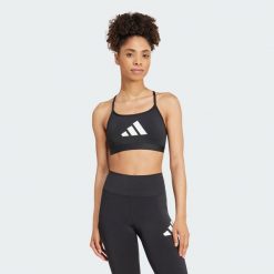 Biustonosz Aeroreact Graphic. Czarne biustonosze sportowe damskie Adidas, bez wzorów, z materiału. Za 119.15 zł.