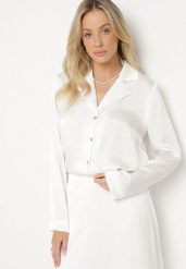 Biała Elegancka Koszula Satynowa z Wycięciami na Dolnej Krawędzi Klirea. Białe koszule damskie Born2be, l, bez wzorów, z jeansu, eleganckie, bez kołnierzyka, bez ramiączek. Za 129.99 zł.