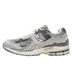 Buty do chodzenia dla dorosłych New Balance 2002R Protection Pack Rain Cloud. Szare obuwie sportowe casual damskie New Balance, bez zapięcia. W wyprzedaży za 1,303.60 zł.