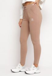 Beżowe Spodnie Dresowe z Gumką w Pasie Baratia. Brązowe spodnie dresowe damskie Born2be, l, bez wzorów, z bawełny. Za 44.99 zł.