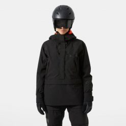 Damska kurtka narciarska Helly Hansen Powchaser Anorak. Czarne kurtki damskie Helly Hansen, na zimę, bez wzorów, bez kaptura. Za 1,084.00 zł.