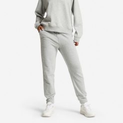 Spodnie dresowe damskie Domyos Gym & Pilates. Szare spodnie dresowe damskie DOMYOS, s, bez wzorów, z bawełny. Za 89.99 zł.
