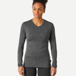 Koszulka trekkingowa damska Forclaz Travel 500 merino. Czarne bluzki damskie FORCLAZ, m, bez wzorów, z jersey, bez kołnierzyka, bez ramiączek. Za 129.99 zł.