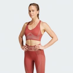 Biustonosz AEROKNIT Training Light Support. Czerwone biustonosze sportowe damskie Adidas, bez wzorów. Za 229.00 zł.