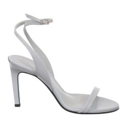 Sandały Calvin Klein perłowo-niebieskie. Niebieskie sandały damskie Calvin Klein, bez wzorów, z materiału, bez obcasa, na obcasie, bez zapięcia. Za 489.99 zł.