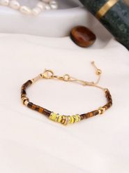 Charlize Pozłacana bransoletka z tygrysim okiem rozmiar: onesize. Brązowe bransoletki damskie Charlize, pozłacane. Za 91.34 zł.