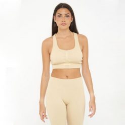 Crop top sportowy ICONIC. Brązowe biustonosze sportowe damskie LEGEA, bez wzorów, z elastanu. W wyprzedaży za 72.00 zł.