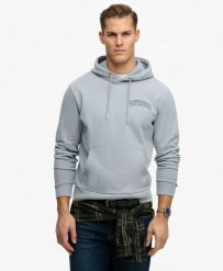 Superdry Bluza z kapturem Athletic Essentials Luźny krój. Niebieskie bluzy damskie Superdry, xl, z aplikacjami, z bawełny, z kapturem. Za 393.05 zł.