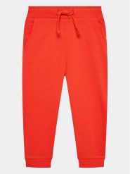 Guess Spodnie dresowe L93Q24 KAUG0 Czerwony Relaxed Fit. Czerwone spodnie dresowe chłopięce Guess, z bawełny. Za 169.99 zł.