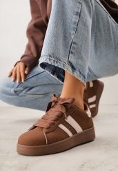 Brązowo-Białe Sneakersy na Niskiej Platformie z Naszywkami Flordexia. Brązowe obuwie sportowe damskie Renee, z jeansu, bez zapięcia. Za 89.99 zł.